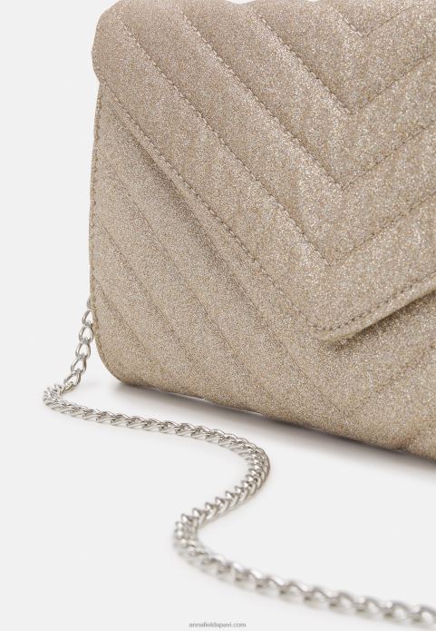 sievietes sajūgs zelta krāsā 2LHT2427 Anna Field